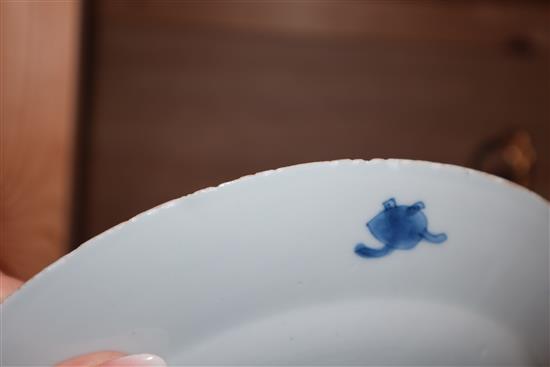 An 18th century Kangxi Chinese blue and white dragon plate and one other. largest diameter 22.5cm